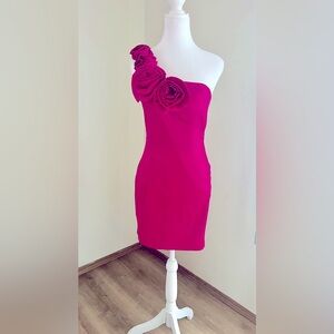 Magenta formal with a sateen finish and floral over one shoulder design!